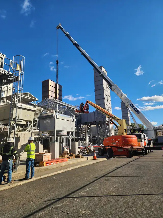 Crane rigging equipment at a natural gas compressor station